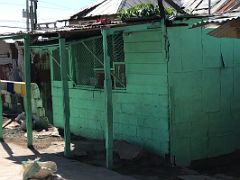 08D A small green shack house on 2nd Street Trench Town Kingston Jamaica